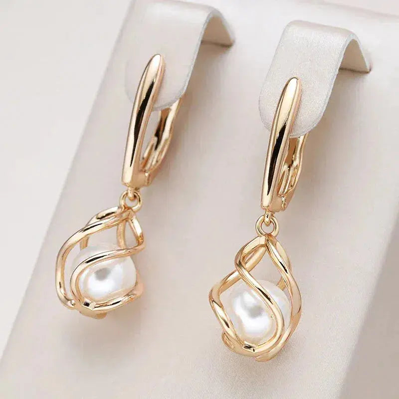 Boucles d'oreilles goutte | Cadre creux avec perle centrale
