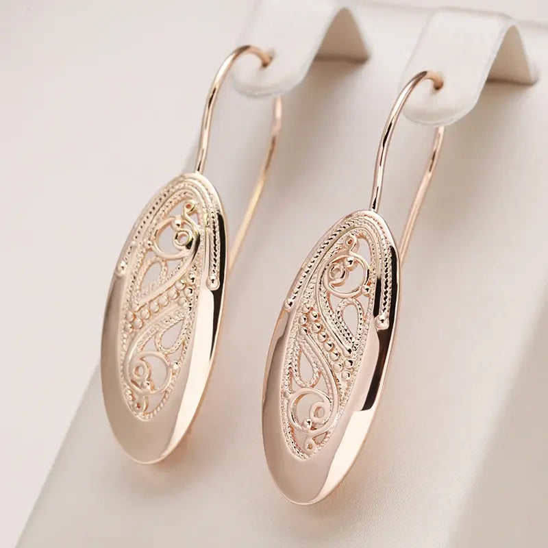 Boucles d'oreilles goutte | Design ovale filigrané en or rose